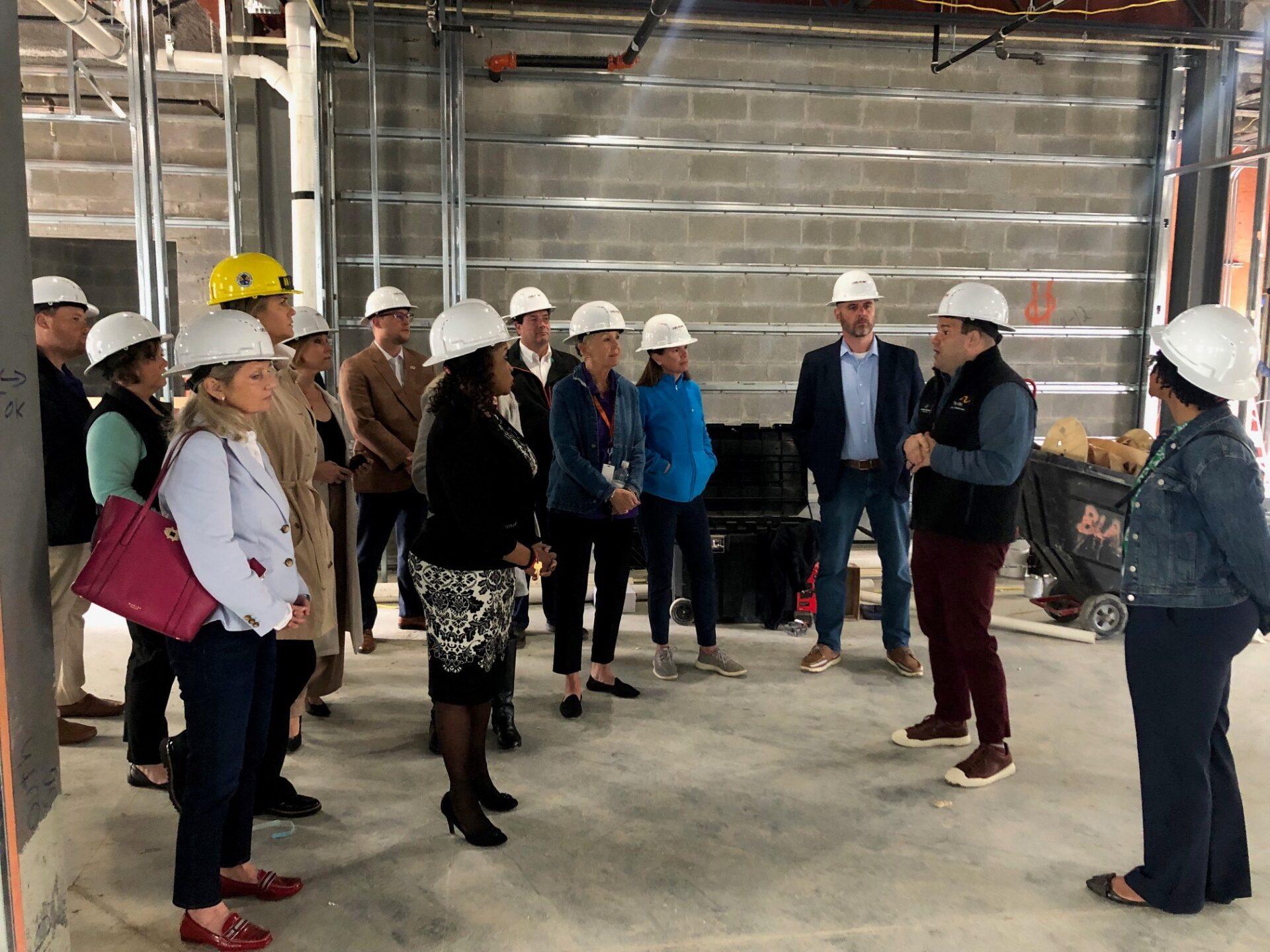 Jonathon Rondeau leads hard hat tours of the Port Street Commons site on Talbot Day